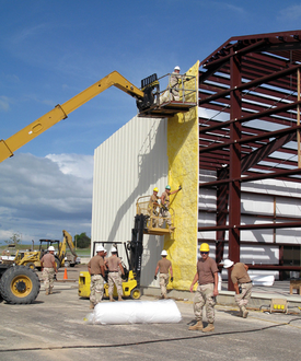 500px-Constructing_court_buildings_in_Guantanamo.png